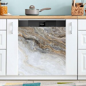 May include: A dishwasher with a decorative front panel featuring a marble-like design in shades of white, gray, and gold. The kitchen appliance is integrated into white cabinetry, with a digital display showing the time.