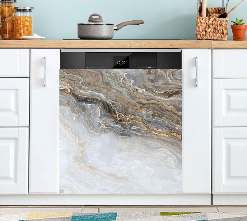May include: A dishwasher with a decorative front panel featuring a marble-like design in shades of white, gray, and gold. The kitchen appliance is integrated into white cabinetry, with a digital display showing the time.