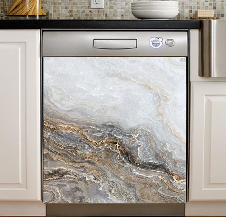 May include: A dishwasher with a decorative front panel featuring a marble-like design. The panel displays a swirling pattern of white, gray, and brown tones, creating a natural stone appearance. The dishwasher has a stainless steel control panel.