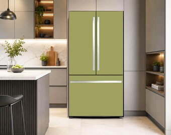 May include: A matte olive green French door refrigerator featuring two vertical doors on top and a single pull-out freezer drawer at the bottom. The appliance is equipped with long, slender, metallic silver handles on each of the three sections.