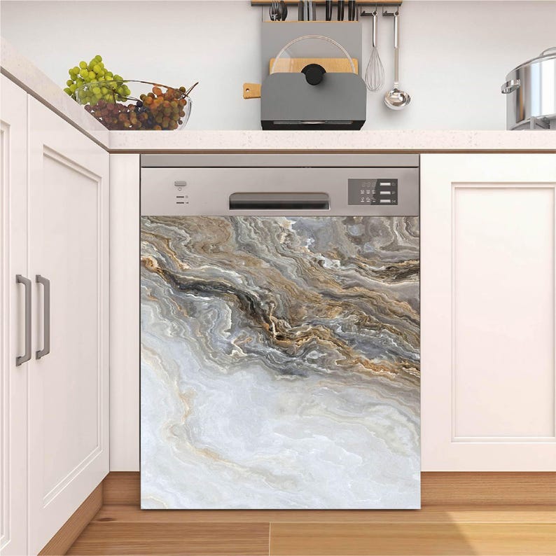 May include: A dishwasher with a decorative front panel featuring a marble-like design in shades of white, gray, and brown. The appliance is set in a white kitchen with a countertop and cabinets.