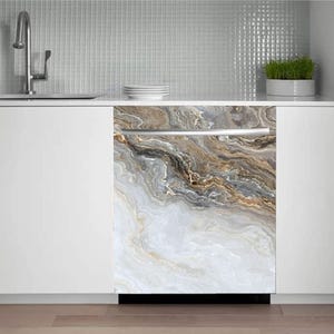 May include: A dishwasher with a decorative front panel featuring a marble-like design in shades of white, gray, and gold. The panel has a flowing, abstract pattern, adding a touch of elegance to the kitchen appliance.