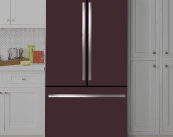 May include: A dark brown refrigerator with stainless steel handles and a freezer drawer.
