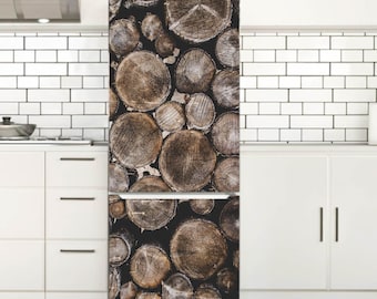May include: A refrigerator featuring a full-length wrap with a high-resolution photographic print of stacked brown and grey circular tree log cross-sections. The pattern covers the entire front surface of the appliance, including the freezer and fridge doors.