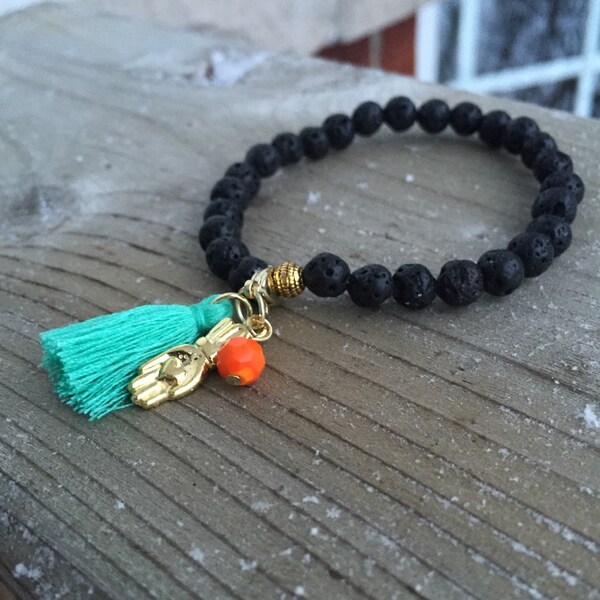 Diffuser Lava Rock Bracelet with Heart in Hand Charm and Tassel.