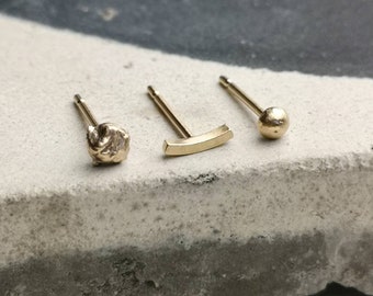 Mismatched set of three solid gold studs, with a choice of colours