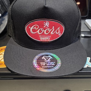 Coors Banquet Trucker hat solid black top level