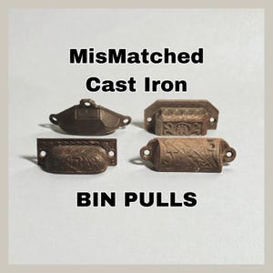 May include: Four mismatched cast iron bin pulls in various shapes and designs. The pulls are in shades of brown and feature ornate detailing. The text "MisMatched Cast Iron BIN PULLS" is displayed in black.
