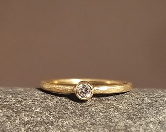 Engagement ring in gold, forged diamond ring handmade in Hamburg