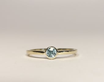 delicate & BLUE!! simple, elegant engagement ring with real blue zircon