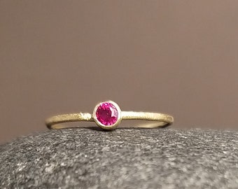 great ruby ring - engagement ring in gold with a bright red ruby