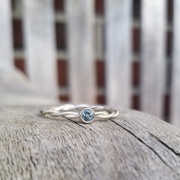 Engagement ring light blue topaz in silver - cord ring