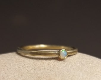 delicate opal ring in yellow gold - engagement ring gold