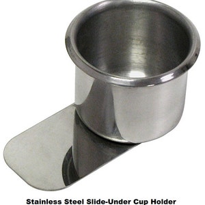 May include: A stainless steel slide-under cup holder. The holder has a round cup and a flat base that slides under a surface.