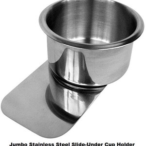 May include: A stainless steel slide-under cup holder with a large, round cup holder and a flat, rectangular base.