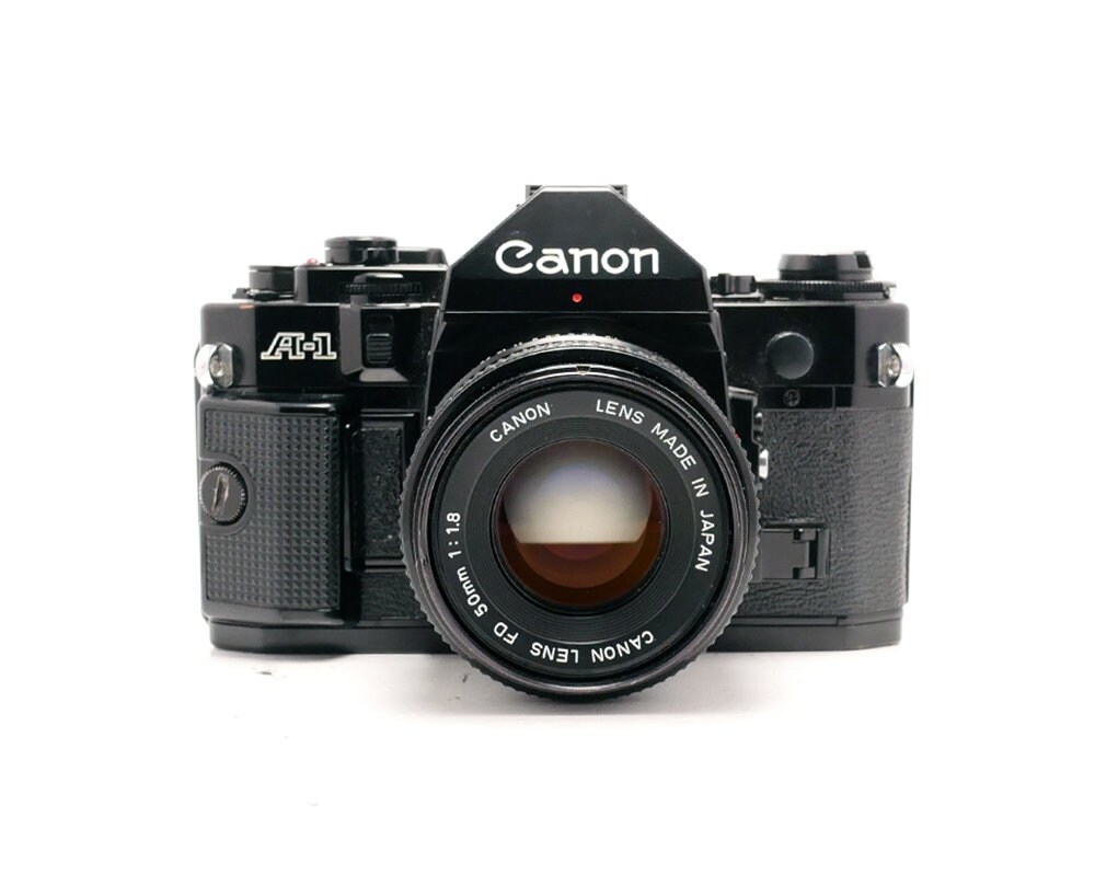 Canon A1 + Objectif 50mm FD 1.8 - Argentique 35mm - Occasion