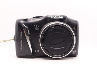 Canon Powershot SX130 IS - Point and Shoot Digital Camera