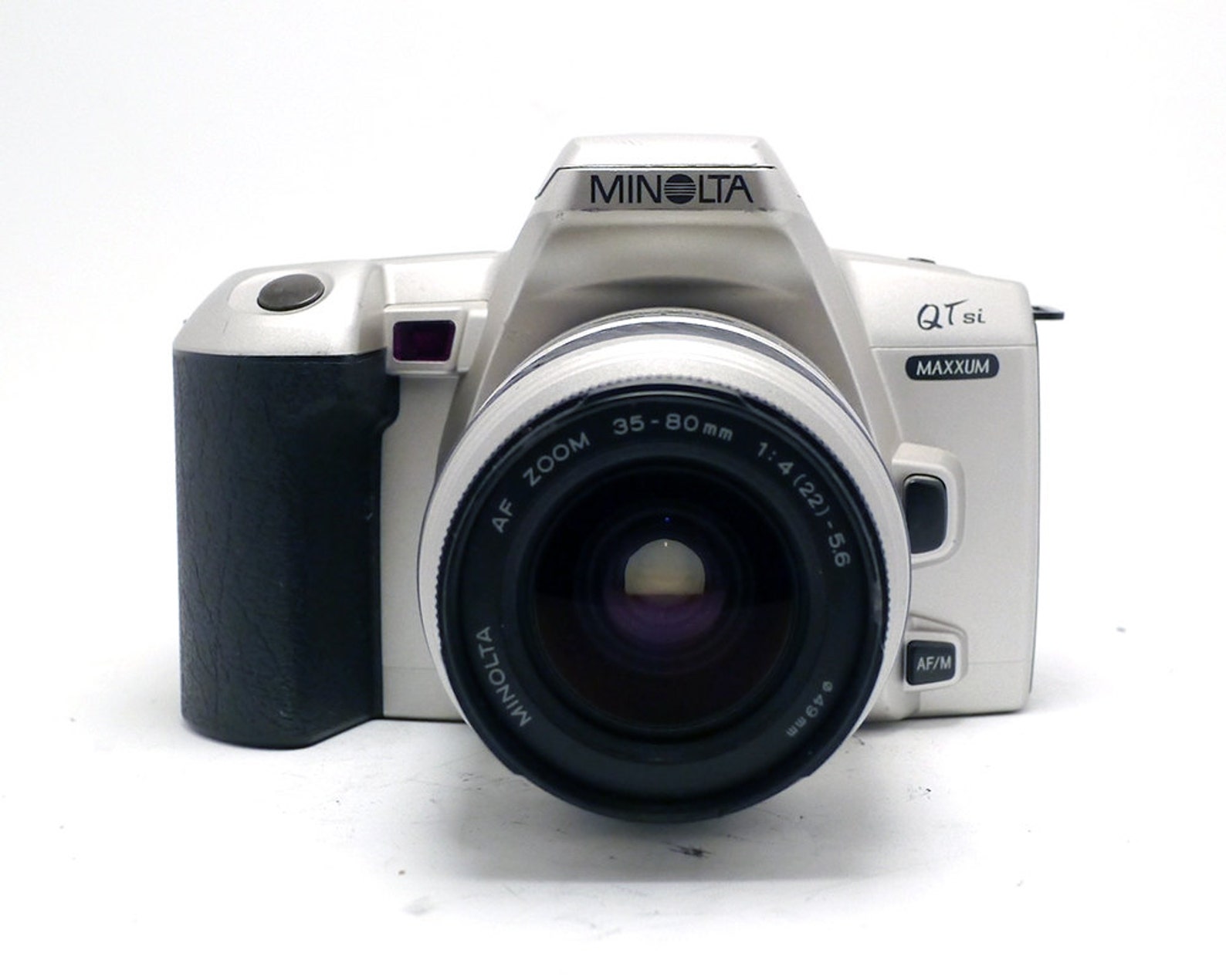 Cámara de película Minolta Maxxum 300si Auto Focus SLR de 35 mm con lente de zoom Sigma de 70 mm