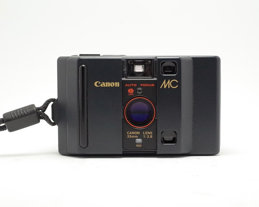 Canon MC コンパクトフィルムカメラ il_fullxfull.1120730308_gxl6.jpg