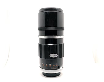 Canon 200mm  f/4 - FL Mount - 35mm film camera lens.