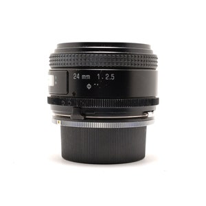 Tamron 24mm f/2.5 - Nikon F mount- 35mm film camera lens.