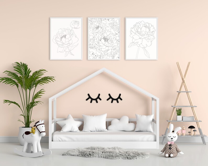 May include: A white wooden bed frame with a white mattress and pillows. There are three black and white line drawings of peonies on the wall above the bed. A white rocking horse and a stuffed bunny are on the floor in front of the bed.