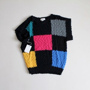nubby black sweater | checkered sweater | neon pink sweater
