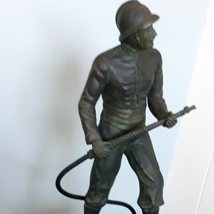 French fireman (Le Pompier) Statue