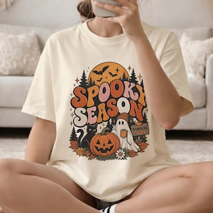 Spooky Season Ghost Pumpkin Halloween T-shirt | Retro Haunted Forest | Breast Cancer Awareness Shirt
