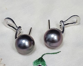 Genuine 11.6mm Black Tahitan pearl in 18kt white gold omega back earrings