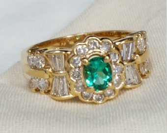 Custom made 14kt. yellow gold Vintage inspired genuine oval emerald and genuine round, baguette diamond band