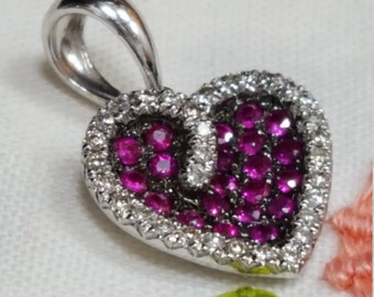 Ruby and Diamond heart pendant set in 14kt. white gold