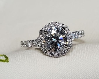 Gorgeous white gold halo natural diamond engagement ring!
