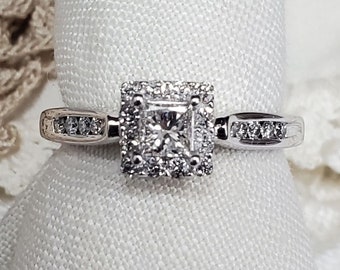 Lovely 14k white gold princess cut diamond ring.