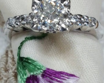 Vintage old European cut round diamond .75ct. set in a newly made vintage era style diamond ring.