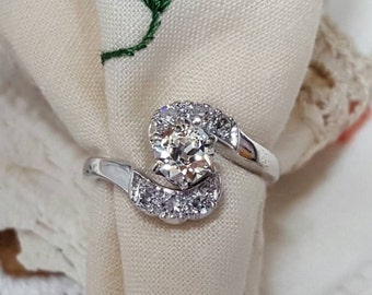 Vintage platinum ring with old European round cut diamond.