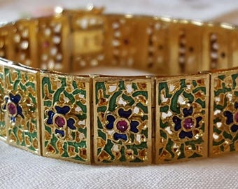 Vintage handmade 18k yellow gold bracelet with rubies and hand painted enamel gorgeous work detail and rare weighing a heavy 36.3 grams!