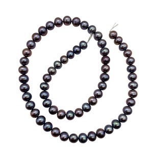 May include: A strand of dark gray pearls, each with a lustrous sheen. The pearls are round and evenly sized, strung together on a thin, white string. The background is plain white, highlighting the jewelry.