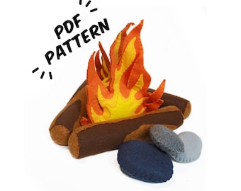 May include: A felt campfire craft pattern, with a PDF pattern label. The pattern includes a campfire with orange and yellow flames, brown logs, and gray rocks.