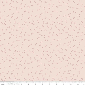 May include: A light pink fabric with a repeating pattern of small, dark red leaf-like shapes. The pattern is evenly distributed across the fabric, creating a subtle, textured appearance. The fabric is measured in inches.
