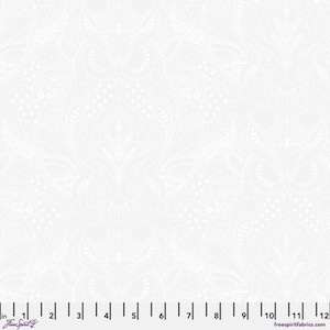 May include: White fabric with a detailed, intricate floral and paisley pattern. The design features a repeating motif of stylized flowers, leaves, and geometric shapes, creating a textured, all-over design. The fabric is suitable for quilting, apparel, or home decor projects.