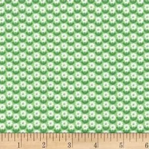 May include: White fabric with a repeating pattern of small green circles with a white center. The circles are arranged in a grid pattern.