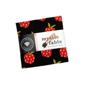 May include: A stack of fabric squares with a black apple print. The fabric is labelled "mystic fable" and measures 12.7 cm square. The label also features the Ruby Star Society logo.