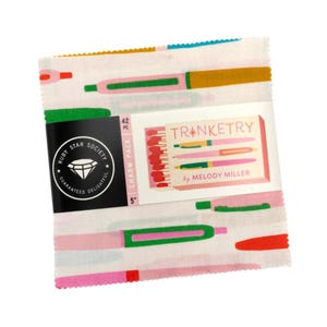 May include: A stack of fabric squares with a repeating pattern of colorful pens on a white background. The package includes a label that reads "Trinketry by Melody Miller" and "Ruby Star Society". The charm pack is 5 inches.