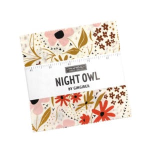 May include: A fabric bundle featuring floral patterns in pink, red, and brown on a cream background. The bundle is wrapped with a white label that reads "NIGHT OWL" by "GINGIBER". The fabric is pre-cut for quilting projects.