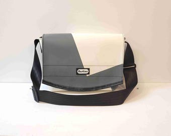 Small satchel made from recycled truck tarpaulin