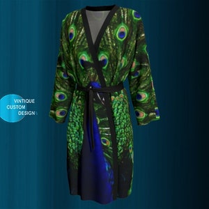 May include: A green and blue peacock patterned kimono robe with a black sash.