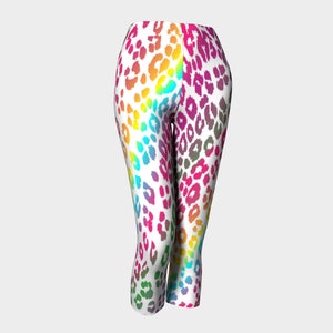 May include: White leggings with a rainbow leopard print pattern.