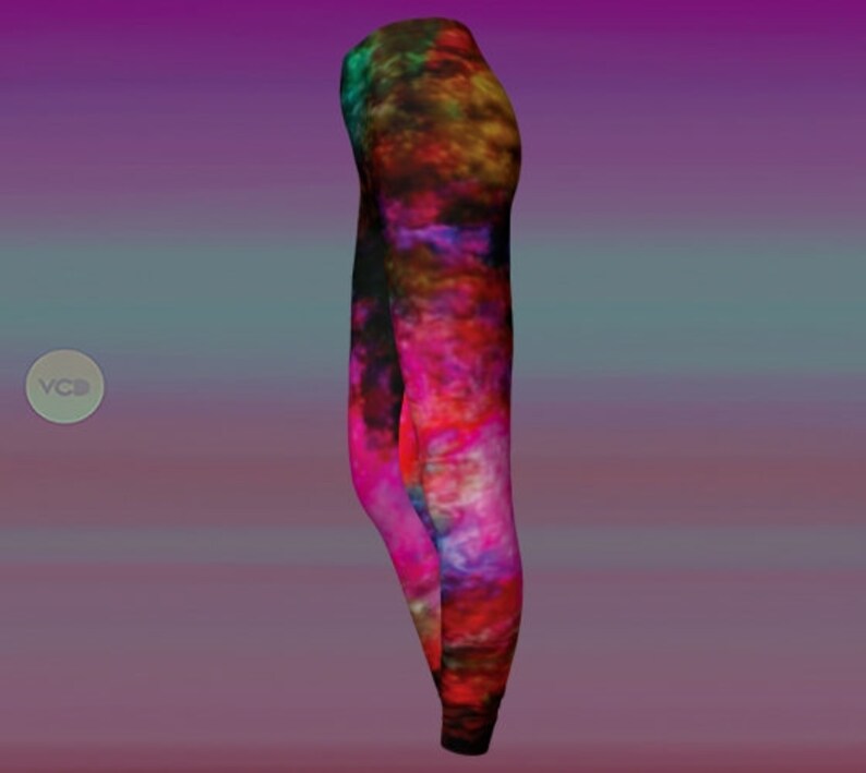 May include: Colorful leggings with a galaxy-like print in shades of pink, purple, blue, and green.