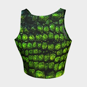 May include: Green crop top with a reptile skin pattern.
